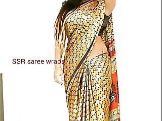 Experienced Telugu aunty seduces with her alluring saree, leading to a passionate encounter in a titillating video.